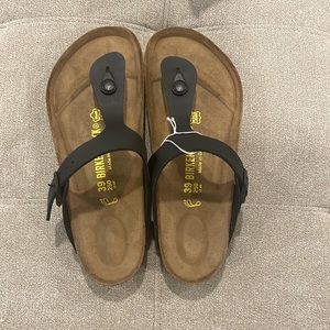Completely brand new and unworn Birkenstock flip flop sandals